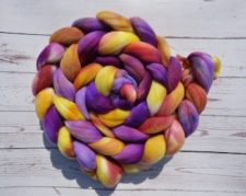 Brightly colored roving in a coiled braid