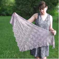 Aloisa shawl is a classic triangle shawl with slightly textured and lace pattern worked in one piece from the center back to the bottom edge. Texture is lacy diamonds.