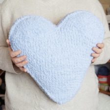 Crocheted heart shaped pillow.