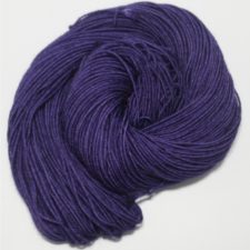 Semisolid yarn in deep, cool tone.