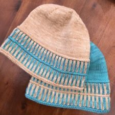 Stocking cap with two-color brioche brim.