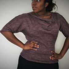 sweater with relaxed boat neck and elbow length sleeves.