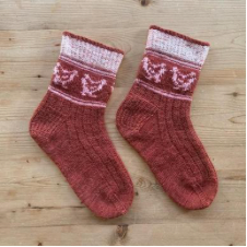 Simple socks with colorwork chickens around the cuff.