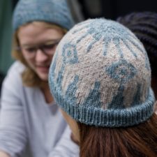 Colorwork beanie with backgammon board design.