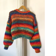 Colorful fisherman ribbed sweater with poufy sleeves.