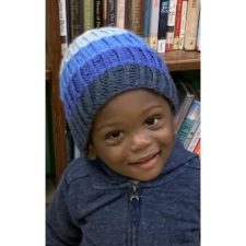 Child’s hat in four or five horizontal stripes