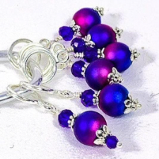 Deepest cobalt and hot pink frosted beads on stitch markers.