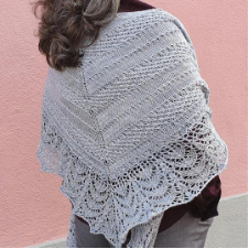 Large triangular shawl with several interesting textures. Bottom edge is lace.