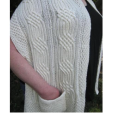 Lightweight pocket shawl with panels of eight-strand cables.