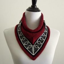 Bandana-style cowl with a classic mosaic border; worked from the top down and seamed.