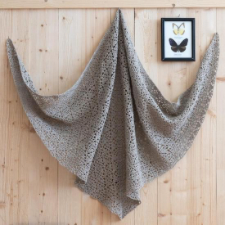 The start to this generous lace triangular shawl looks just like a butterfly.