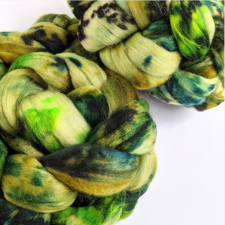 Braids of fiber with splotches of camouflage colors.