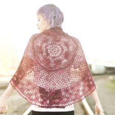 Finely knit, round lace shawl.