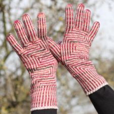 Striped gloves with geometric panels.