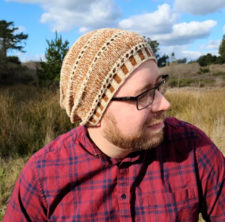 Slouchy hat with yarnover rows between sections.