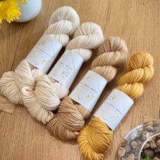 Four skeins in shades of caramel.