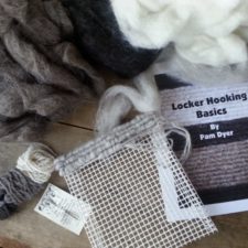 Kit contains needlepoint canvas, locker-hooking needle, fleece and instructions to make a small trivet.