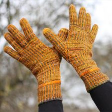 Striped gloves with geometric panel