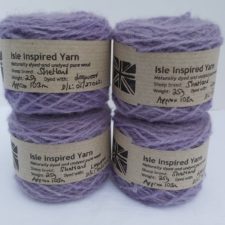 Lavender color cakes of yarn