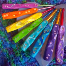 Array of ergonomic hooks featuring cupcakes and petit fours.