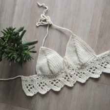 Crocheted Bikini top with longer lace band at the bottom.
