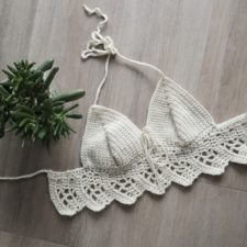 Crocheted Bikini top with longer lace band at the bottom.