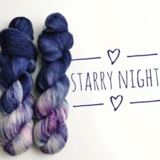 Two skeins are half deep, night-sky blue and half speckled purples and pinks.