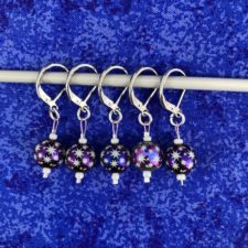 Starry stitch markers with earring back closures.