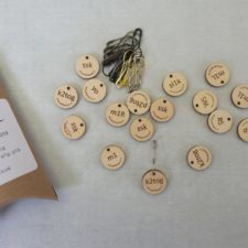 Stitch markers that indicate the next stitch