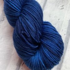 Deep, semi-solid blue skein