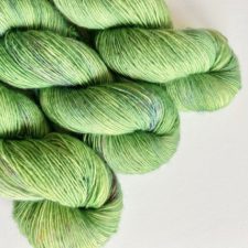 Bright tonal yarn in light greens.