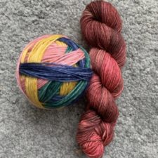 Ball of self-striping yarn and coordinating color.