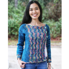 Longsleeve pullover with texture and pattern across front in short rows and a second color.