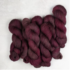 Variegated yarn in red wine colors