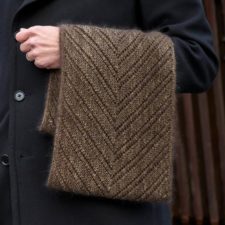 Cedar Hill Cowl uses a combination of garter stitch and simple lacework to create an offset chevron motif that evokes the needles on the branches of the evergreen trees that give Cedar Hill in Manhattan's Central Park its name.