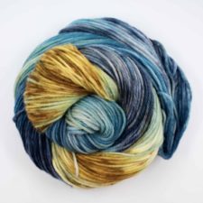 Swirled skein in sand and sea colors.
