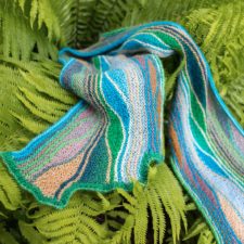 Short-row scarf in several colors. Short rows make a leaf motif.