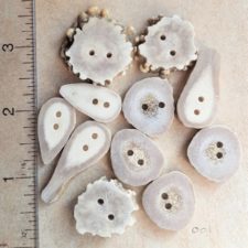 Antler buttons in various shapes from round to teardrop.