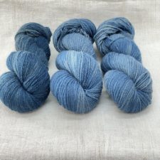 Tonal yarn dyed with indigo.