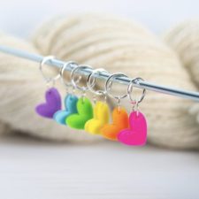 Bright heart-shape stitch markers in the colors of the rainbow.