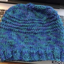 Textured beanie with two-stitch rib brim.