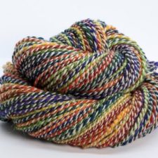 Marled yarn in rainbow gradient.