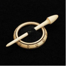 Hand turned shawl pin. Wooden ring with hand-burned diamonds and a hand-turned stick.
