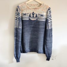 Pullover with Star Wars colorwork across the front and R2D2 on the sleeves.