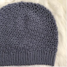 Crocheted beanie with ribbed brim and beautiful, simple texture throughout.