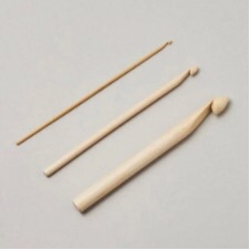 Wooden crochet hooks from small to large.