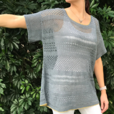 Openwork linen top in different textured stitches. Rectangular body with short sleeves. Lots of ease.