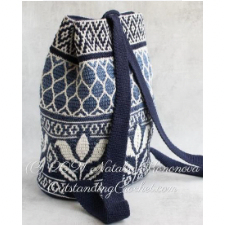 Backpack with floral and geometric motifs.