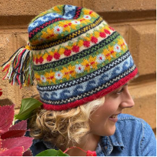 Waves, cherries and other motives in Fair Isle beanie.