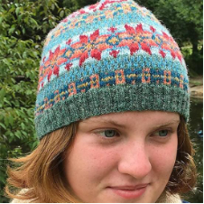 Geometric Fair Isle beanie with star motifs.